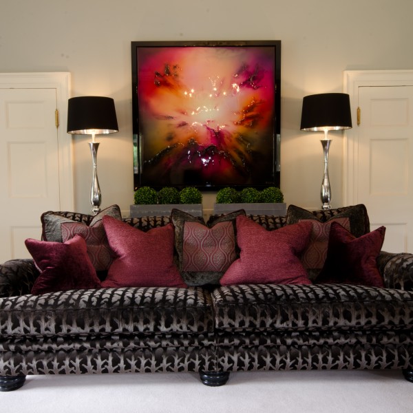 Mink velvet sofa with deep red furnishings from traditional home design
