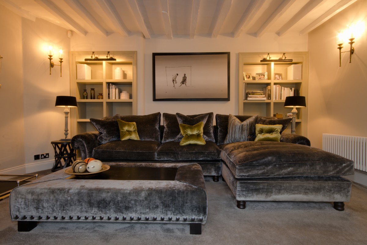 Luxury velvet sofa in a sitting room interior design