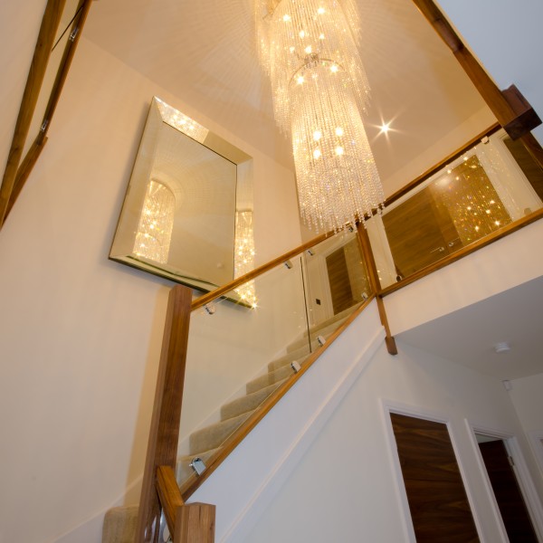 free falling chandelier stairway interior